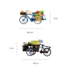 The Vietnamese Bike Vendor Magnet from the Little Vietnam Collection is a creative refrigerator magnet - an exquisite handmade gift and an impressive Vietnamese souvenir for any travel enthusiast.