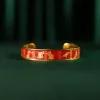 The "Cat & Box" Metal Cuff Bracelet With Hand-Painted Leather is a handmade fashion accessory that beautifully highlights individuality, making it a perfect birthday gift for her.