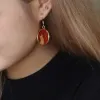 The "Cat & Box" Earrings with Hand-Drawn Leather feature distinctive strokes and artistic design, making them the perfect fashion accessory and a thoughtful birthday gift for her or a gift for your girlfriend.The "Cat & Box" Earrings with Hand-Drawn Leather feature distinctive strokes and artistic design, making them the perfect fashion accessory and a thoughtful birthday gift for her or a gift for your girlfriend.