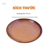 Đĩa Tròn Men Nâu Tuyết Hỏa Biến không chỉ là đĩa gốm Bát Tràng cao cấp, mà còn mang đến trải nghiệm bữa ăn thanh lịch, thu hút với gốm hỏa biến độc đáo, phù hợp để trang trí nhà cửa hoặc làm quà lưu niệm tinh tế.