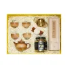 "Amber Harmony" gift box – premium wellness gift set in upscale yellow tone featuring tea set with filter, agarwood, and cordyceps for a luxurious experience.
