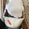 Túi Đeo Chéo Bán Nguyệt Trắng Denim là dấu ấn thời trang tái chế với thiết kế độc bản, chiếc túi vải denim này không chỉ là phụ kiện thời trang bền vững mà còn là món quà sinh nhật cho nữ đầy cá tính và ý nghĩa.