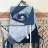 Balo nắp hoa từ jeans tái chế với nét chấm phá tinh tế của thời trang, phụ kiện độc bản làm quà sinh nhật thủ công ý nghĩa.