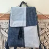 Blue mix backpack from old jeans conquering minimalist enthusiasts, an upcycled fashion accessory and unique birthday gift for sustainable style lovers.