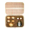 "An Lac" gift box captivates through every detail featuring an elegant brown-themed gift set with a traditional teapot along with premium cordyceps and pure honey, all beautifully presented in a handcrafted bamboo rattan gift box.