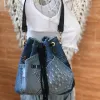 Blue printed letter bucket bag from old jeans with passion infused in every detail, creating an upcycled convenient drawstring bag and impressive birthday gift