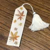 Bookmark thêu tay với họa tiết tinh tế, điểm xuyến nét duyên dáng cho từng trang sách, là món quà thủ công ý nghĩa dành tặng những tâm hồn yêu đọc.