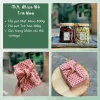 Hộp quà mứt atiso và trà hoa với vị nhẹ nhàng gửi gắm yêu thương, được đóng gói trong hộp quà quấn khăn độc đáo, là món ăn vặt lành mạnh, quà tặng tốt cho sức khỏe và set quà đặc sản truyền thống của Việt Nam.
