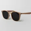 Brown frame sunglasses made from recycled plastic featuring an impressive elegant design, providing effective UV protection with premium quality, serving as both an eco-friendly recycled accessory and unique thoughtful birthday gift.