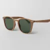 Brown frame sunglasses made from recycled plastic featuring an impressive elegant design, providing effective UV protection with premium quality, serving as both an eco-friendly recycled accessory and unique thoughtful birthday gift.