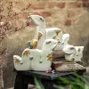 Bộ ba tượng gia đình rắn vuông gốm sứ tôn vinh hình tượng linh thiêng bao đời, kết hợp giữa nghệ thuật gốm truyền thống và biểu tượng văn hóa Việt Nam, tạo nên món quà tân gia ý nghĩa và quà lưu niệm độc đáo đậm chất Việt.
