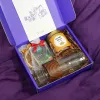 The exclusive "Caring" gift box delivers heartfelt affection through exquisite flavors, featuring a premium tea and jar set with cashews and dried orange – a refined gift for every special occasion.