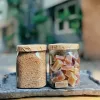 Hộp quà mứt rong sụn và trà gừng mang đến trải nghiệm say đắm với những hương vị đặc sản hiếm có, được đóng gói trong hộp quà cột khăn vintage tinh tế, là món ăn vặt tốt cho sức khỏe và set quà tặng đặc sản độc đáo của Việt Nam.Hộp quà mứt rong sụn và trà gừng mang đến trải nghiệm say đắm với những hương vị đặc sản hiếm có, được đóng gói trong hộp quà cột khăn vintage tinh tế, là món ăn vặt tốt cho sức khỏe và set quà tặng đặc sản độc đáo của Việt Nam.