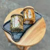 Hộp quà mứt nghệ và trà hoa đưa bạn chìm đắm vào những hương vị tinh hoa đặc trưng, được đóng gói trong hộp quà quấn khăn vintage nghệ thuật, là món ăn nhẹ tốt cho sức khỏe và set quà đặc sản truyền thống của Việt NamHộp quà mứt nghệ và trà hoa đưa bạn chìm đắm vào những hương vị tinh hoa đặc trưng, được đóng gói trong hộp quà quấn khăn vintage nghệ thuật, là món ăn nhẹ tốt cho sức khỏe và set quà đặc sản truyền thống của Việt Nam