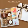 Relax Tea gift box conveys complete peaceful wishes through premium tea set with elegant infuser plus pure honey and coffee-covered chocolate, creating sophisticated gift featuring authentic Vietnamese specialties perfect for corporate gifting.