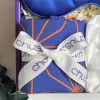Feminine silk gift box featuring exclusive Vietnamese silk eye mask, hair tie and scarf set, creating gentle moments as perfect birthday gift for her