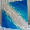 Smooth epoxy resin art measuring 30 x 30cm captures gentle ocean beauty through 3D epoxy resin seascape techniques, creating handcrafted wall art perfect as meaningful housewarming gift.