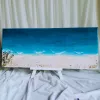 3D epoxy resin beach painting captures vibrant ocean beauty through lifelike dimensional effects, showcasing exquisite handcraftsmanship as distinctive home decor, impressive artistic gift and unique housewarming present.