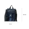 Rugged style mini backpack crafted from old jeans creates street fashion eye-catching impact with convenient drawstring design, serving as sustainable fashion accessory and creative birthday gift