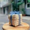 Sliced ginger candy bamboo gift box 350gr with natural refined flavor, featuring cold relief ginger as healthy candy making a perfect gift for family and Vietnamese specialty gift