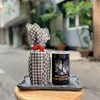 HeyDay pure cacao powder gift 200g packaged with original authentic flavor in a premium jar wrapped with Vietnamese plaid scarf, making a distinctive Vietnamese specialty gift.