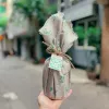 Quà tặng quất sành gói khăn vải xinh xắn 500ml với vị ngon từ thức quà cao cấp, quất ủ muối mật ong và la hán quả làm dịu cổ họng, món quà tặng sức khỏe ý nghĩa.