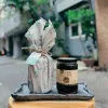 Quà tặng quất sành gói khăn vải xinh xắn 500ml với vị ngon từ thức quà cao cấp, quất ủ muối mật ong và la hán quả làm dịu cổ họng, món quà tặng sức khỏe ý nghĩa.