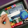 "Enlightenment" personalized gift box creates creative tribute to honor educators with desk calendar featuring 3D pages and premium sweets confectionery gift set as meaningful gift for teachers.