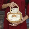 Mini Petal Woven rattan handbag compact embracing pure essence, handcrafted compact handbag sustainable fashion as Vietnamese souvenirs