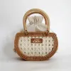 Mini Petal Woven rattan handbag compact embracing pure essence, handcrafted compact handbag sustainable fashion as Vietnamese souvenirs