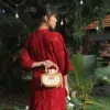 Mini Petal Woven rattan handbag compact embracing pure essence, handcrafted compact handbag sustainable fashion as Vietnamese souvenirs