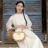 Túi xách mây đan tay Petal Woven nhẹ nhàng như cánh hoa rơi, túi xách tay thủ công công sở phụ kiện thời trang bền vững đồ lưu niệm Việt Nam