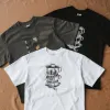 The "Good Times Roll" black cotton T-shirt captures every moment with a creative design, perfect for photography, travel, birthdays, or as a Vietnamese souvenir.