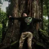 The "Here To Hear" cotton T-shirt connects nature and time with a creative design and comfortable fabric, perfect for travel, adventures, or as a birthday gift.