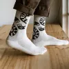 White cotton crew socks with Salaxsaler’s exclusive signature, crafted from soft thick cotton and hand-silkscreened—perfect travel socks, stylish fashion accessory, and unique souvenir.White cotton crew socks with Salaxsaler’s exclusive signature, crafted from soft thick cotton and hand-silkscreened—perfect travel socks, stylish fashion accessory, and unique souvenir.
