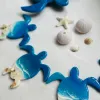 Turtle Family epoxy resin wall clock, handmade and unique, perfect as an impressive housewarming gift and for children.