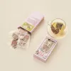 Vietnam Flower Tea combines green tea with blooming flowers in a beautifully packaged set, making it a unique souvenir and convenient specialty gift from Vietnam.