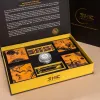 “Brown Moonlight” gift box with 4 chocolate mooncakes, assorted chocolates, nuts & cutlery set – premium Mid-Autumn corporate gift.