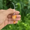 A cute polymer clay keychain featuring plants and animals, handmade with care and perfect as a unique Vietnam souvenir gift.