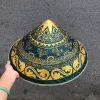Nón lá cỏ bàng vẽ trống đồng mang nét đẹp hùng thiêng, là món quà lưu niệm thủ công Việt Nam độc đáo.