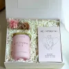 The “Scent Of Calm” gift box combines a sweet sense of peace with a scented candle and inspirational cards