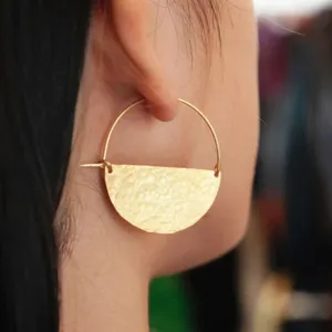 period moon earrings, unique and intricate design, predominantly golden brown, inspired by the image of a crescent moon