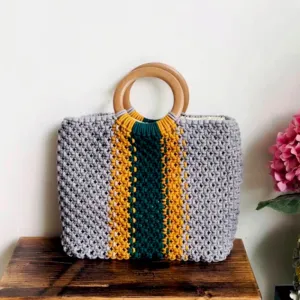 macrame bag with patterns and wooden handle, impressive and eye-catching color combination, unique accessory, a highlight for the outfit