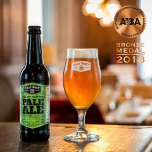 east west pale ale bottle, craft beer, bottle 330ml, handcrafted craft beer, premium brewing, distinctive aroma, pure deliciousness