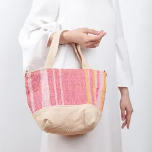 handwoven recycled plastic handbag with round bottom, elegant color, minimalist design, suitable for daily use