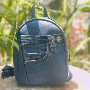 backpack from old jeans, leather lining, youthful design, vibrant colors, compact shape, suitable for outings or strolling