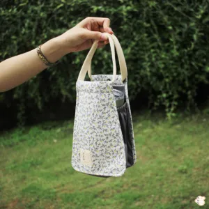 grey flower pattern coffee cup holder, smart and convenient design, feminine patterns, sturdy material, easy to clean.