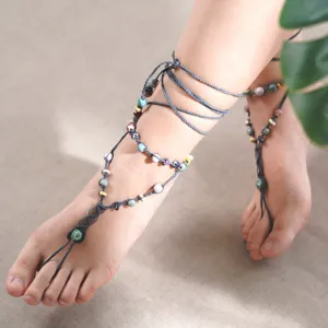 dark blue ceramic bead ankle lace, pastel-toned ceramic beads, wrapped from ankle to foot, standout fashion accessory