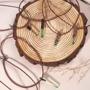 green resin leather necklace, smooth brown leather cord, resin stone pendant, bold and edgy style, fashion accessory