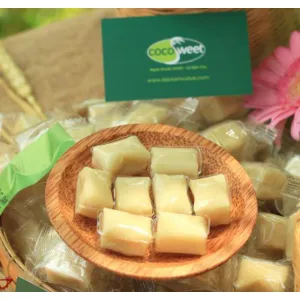 traditional coconut candy, specialty of ben tre, ben tre coconut candy, casual snack, served with tea, fragrant and rich coconut candy